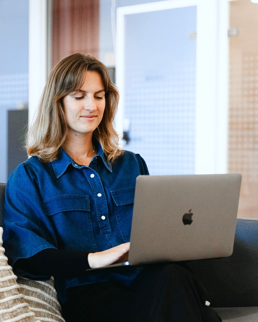 Rikke Egekvist Wainø working from a People's office